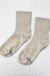 oatmeal socks on a flat surface