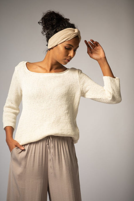 Hand knitted organic cotton sweater in natural white